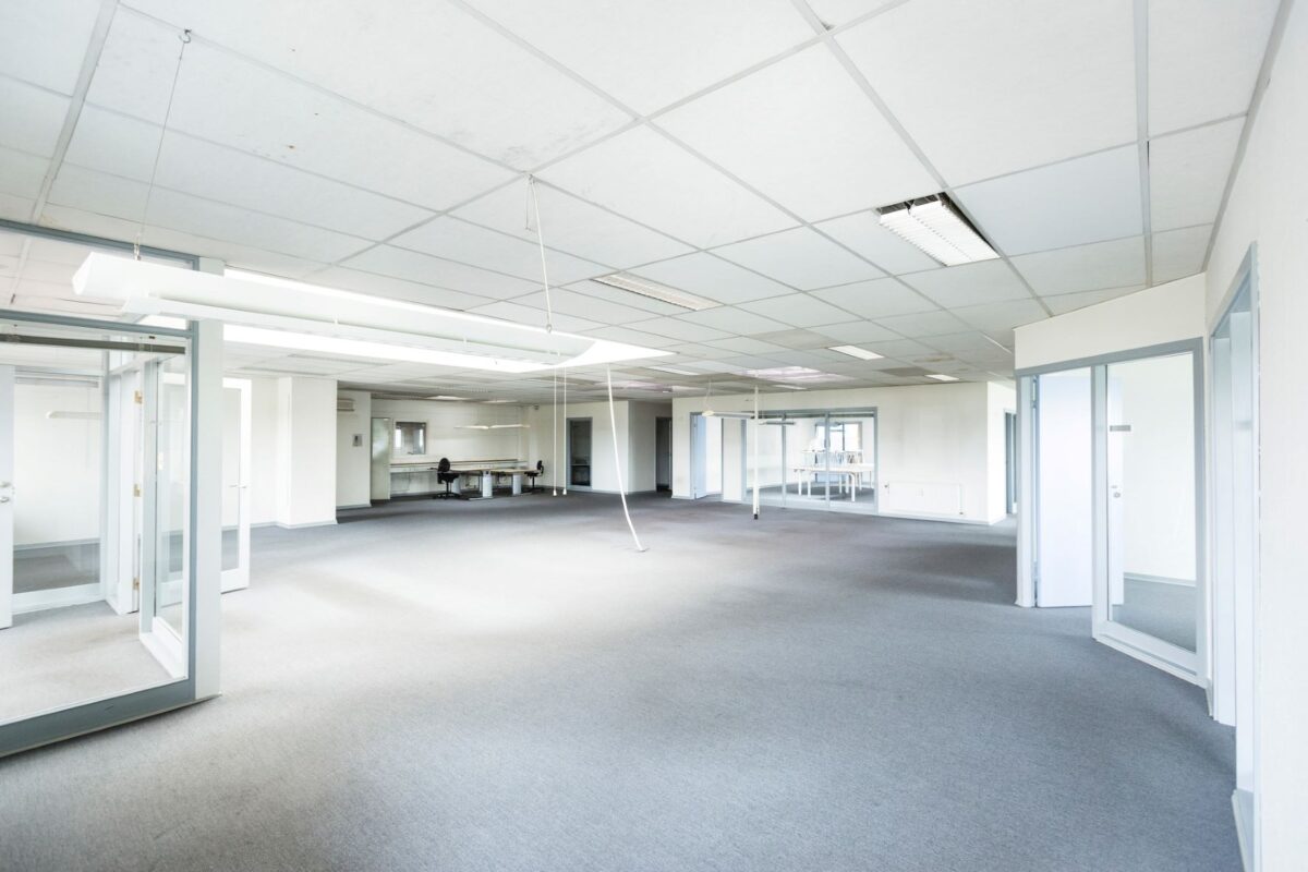 Bare office with a smooth ceiling